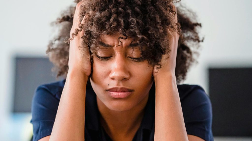 Overwhelmed stressed Woman