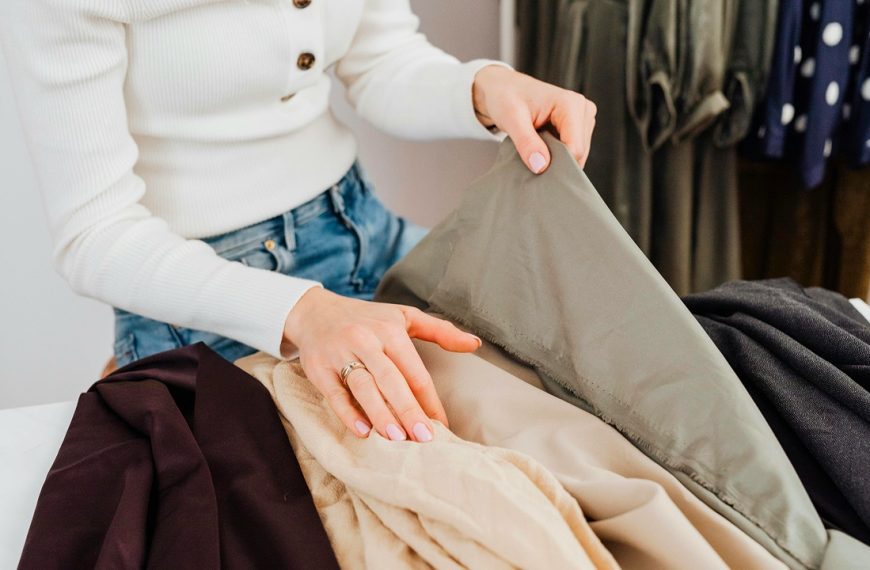 Woman folding clothes