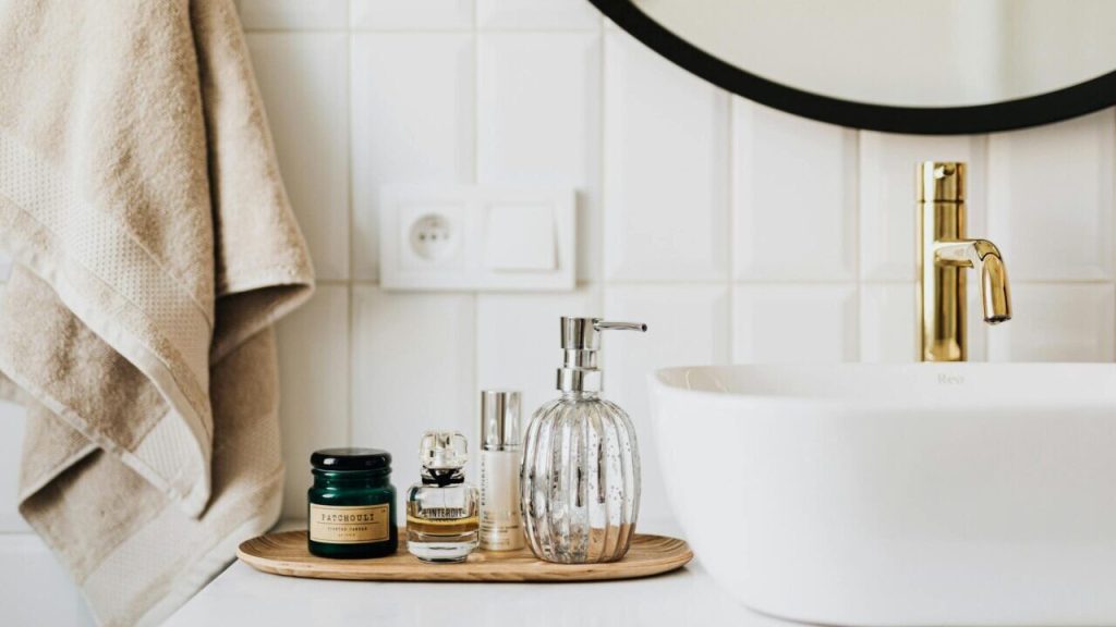 Skincare items on bathroom sink