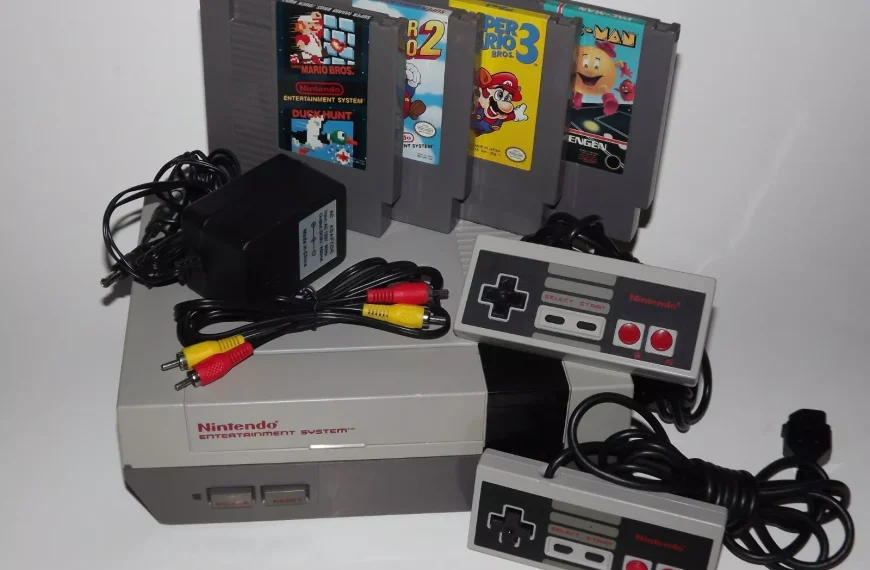 Classic Nintendo Entertainment System (NES), retro gaming console with controllers, collection of NES game cartridges, nostalgic 8-bit gaming experience, vintage video game setup
