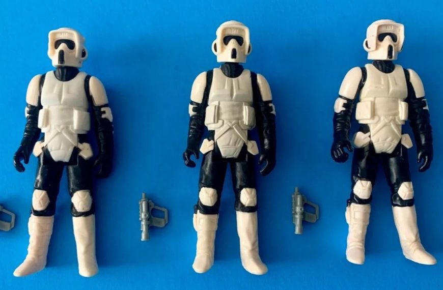 original Star Wars action figures, vintage 3.75-inch scale, detailed character outfits, plastic weapons, 1970s-1980s Kenner design, posed in row, worn paint