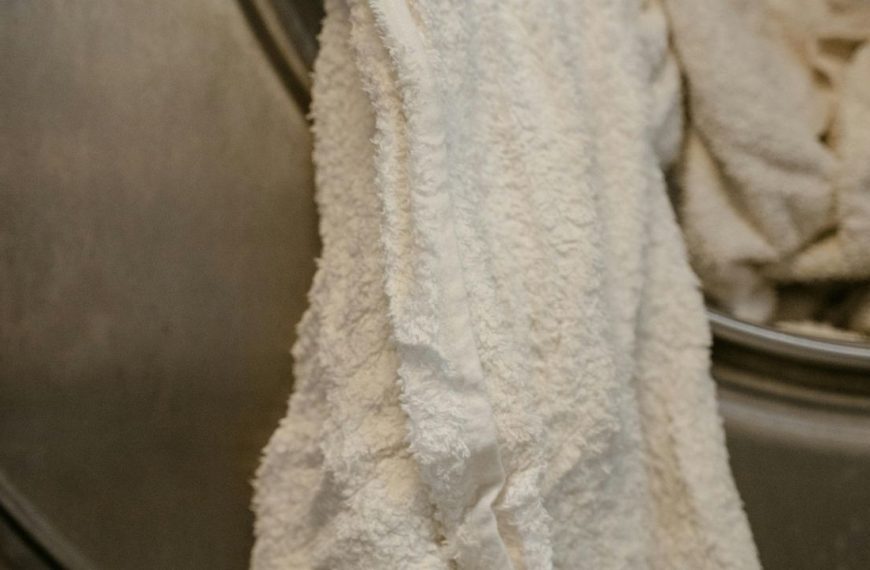 Damp fabric, stained material, household item, needs washing, microfiber or cotton fabric, absorbent cloth, hygiene concern, overused rag, laundry time