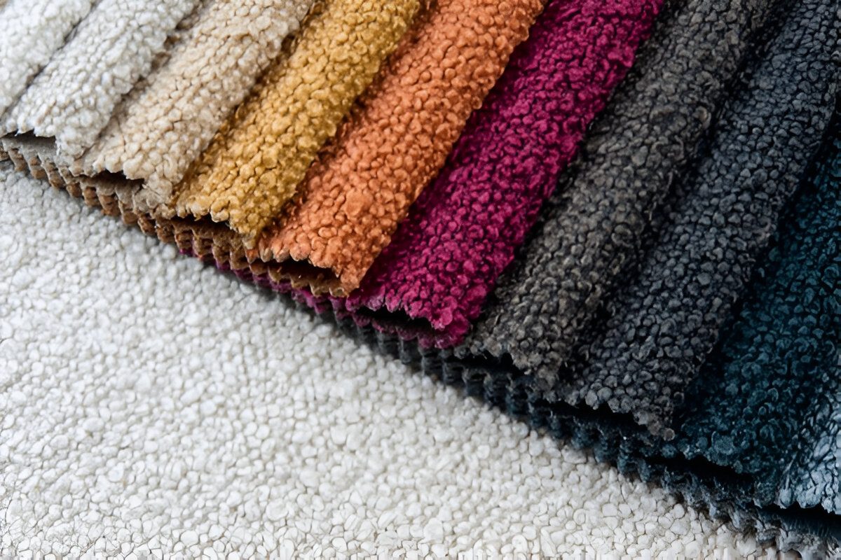 Bright collection of gunny textile samples. Multicolor Fabric texture background. Textiles for modern design. Samples of boucle fabric.