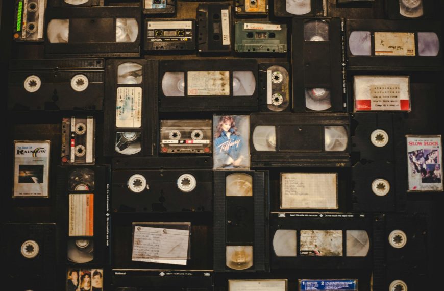 Collection of classic horror VHS tapes, titles include Rosemary’s Baby, The Thing, Frankenstein, The Wolf Man, The Mummy’s Tomb, displayed on white surface