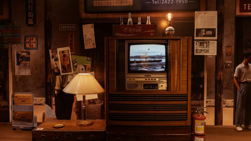Warm, nostalgic scene of a vintage living room with retro TV in Keelung, Taiwan.