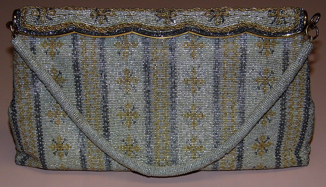 Quilted shoulder bag, floral and striped pattern, yellow and white colors, scalloped flap edge, fabric strap