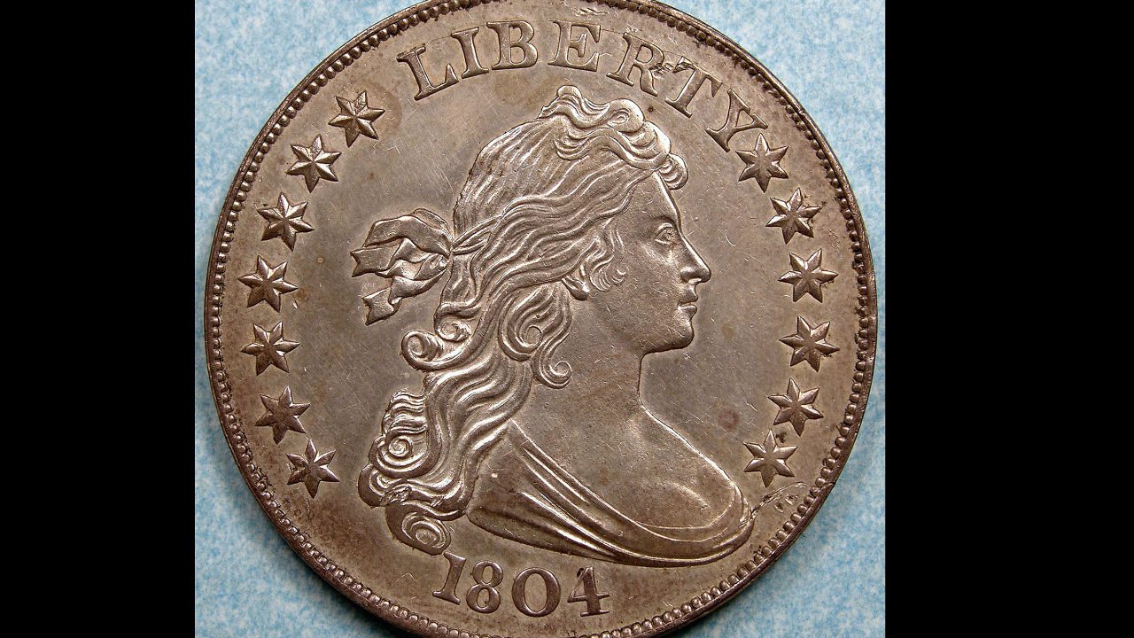 1804 Draped Bust silver dollar, obverse side, featuring a profile of Lady Liberty with flowing hair, surrounded by 13 stars, the word "LIBERTY" at the top