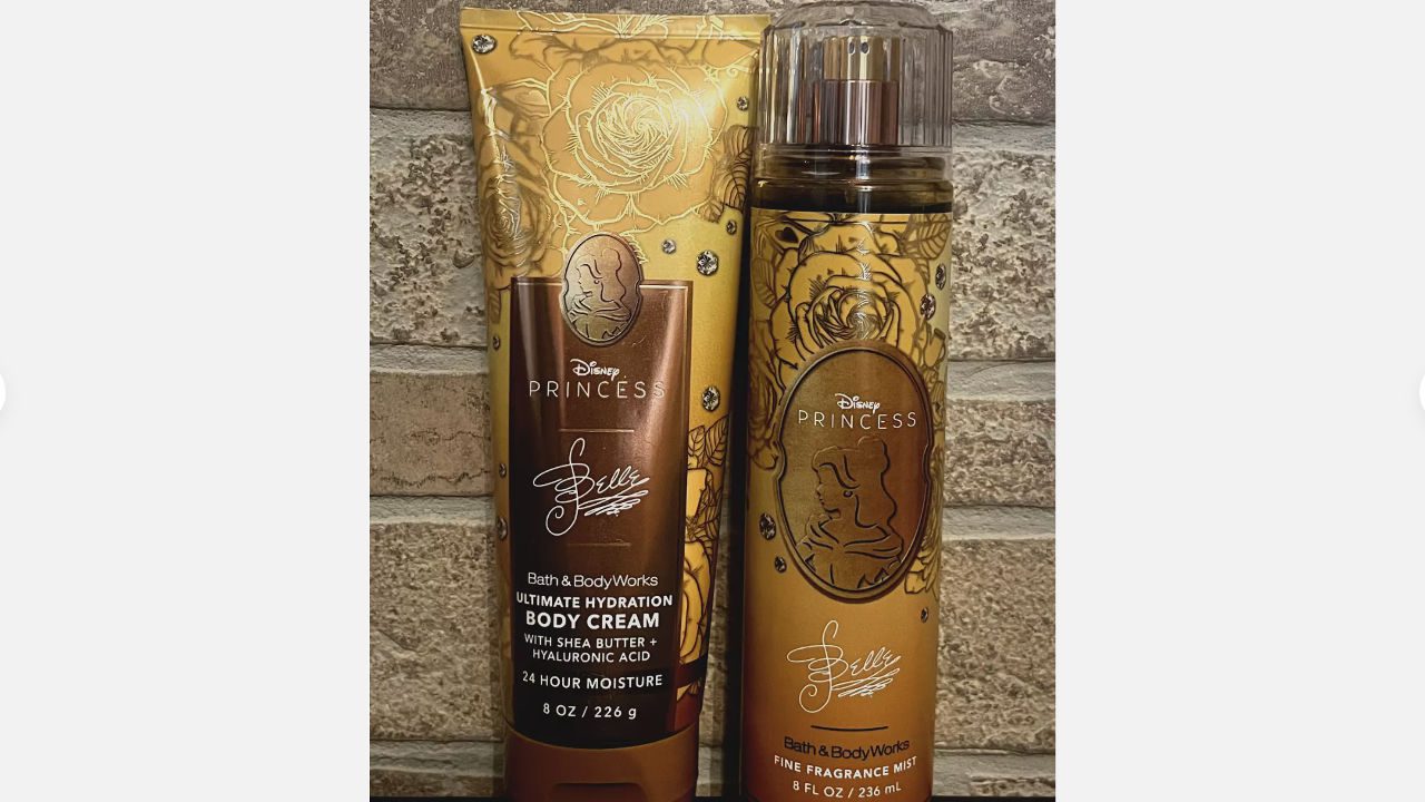 Disney Princess Belle body cream and fragrance mist by Bath & Body Works with golden rose-themed packaging