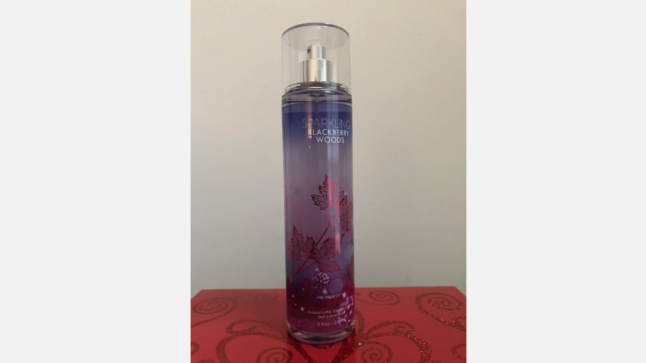 Bath & Body Works Sparkling Blackberry Woods fine fragrance mist in a tall, gradient purple and pink bottle with leaf and berry designs
