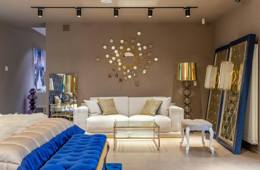 Couch near bed in apartment Brown color schemes wall room