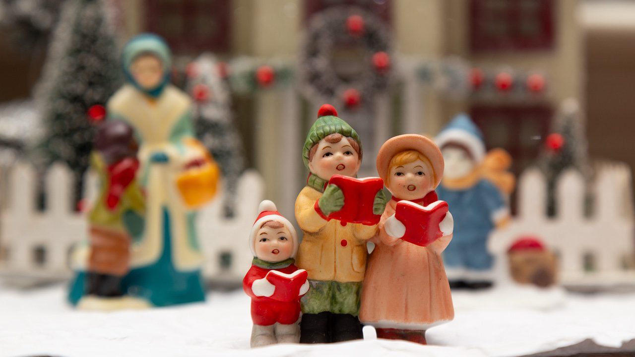 Christmas village singing caroler figurines