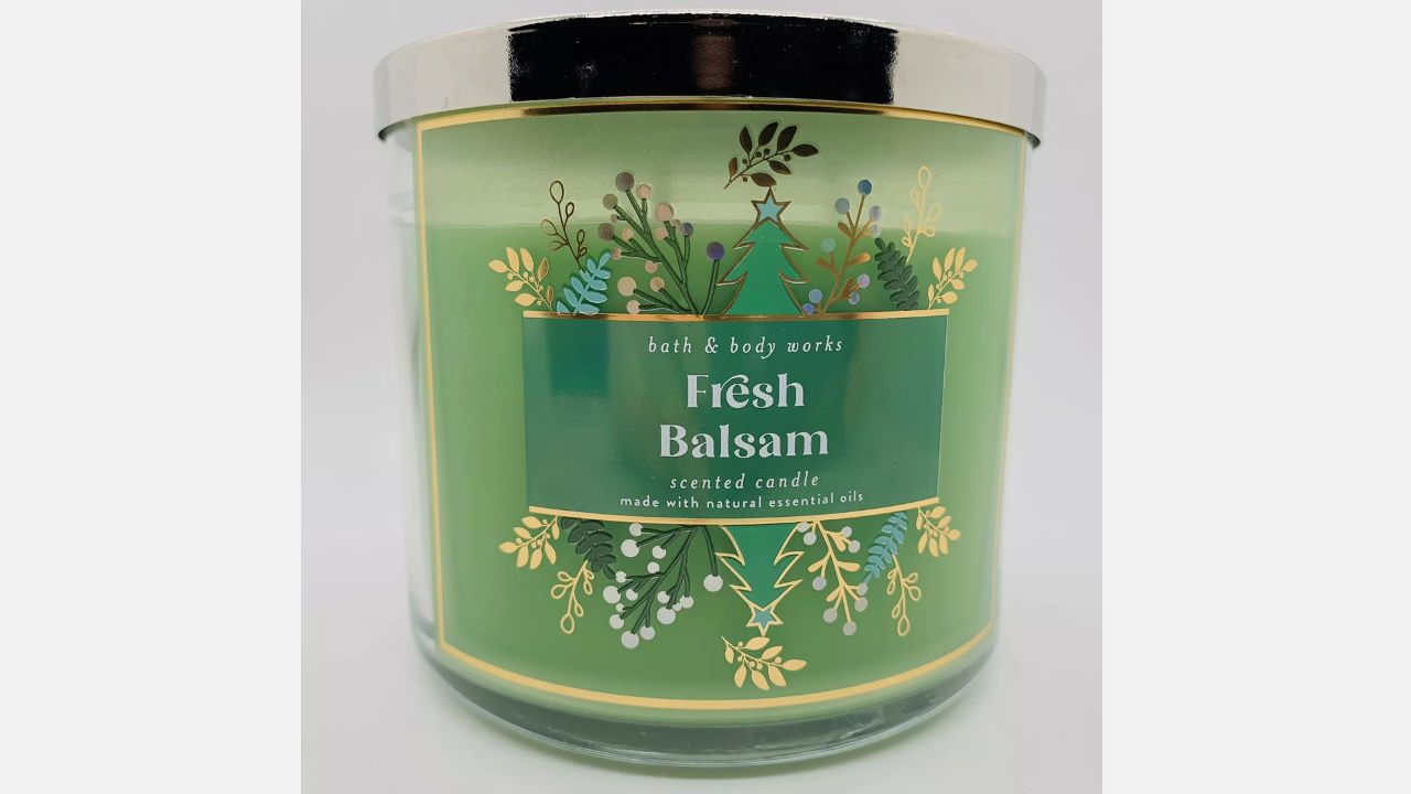 Bath & Body Works Fresh Balsam scented candle in green jar with silver lid and festive botanical design