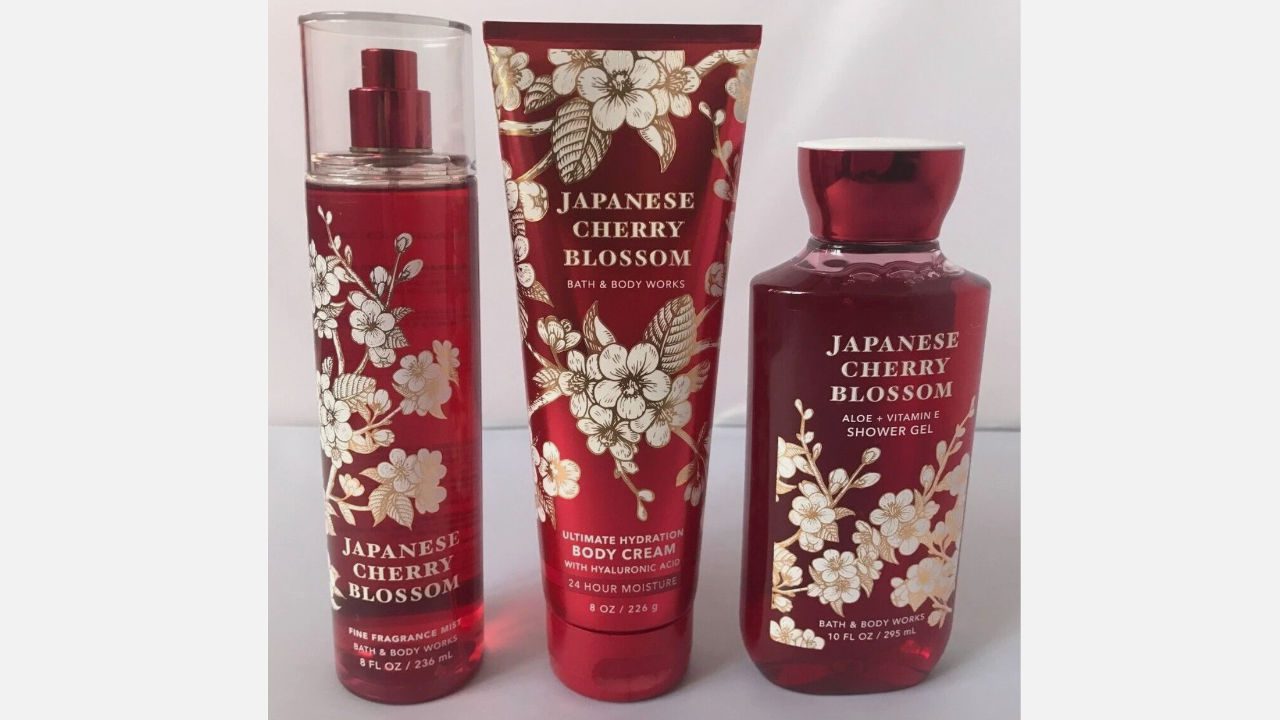 Bath & Body Works Japanese Cherry Blossom fragrance mist, body cream, and shower gel in red packaging with floral design