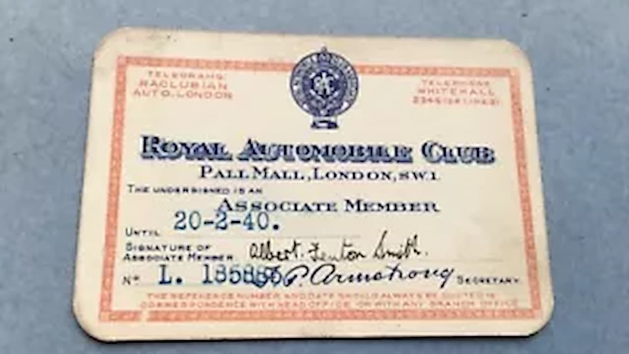 London automobile membership card, sleek design, embossed logo, member name, expiration date, barcode, magnetic stripe