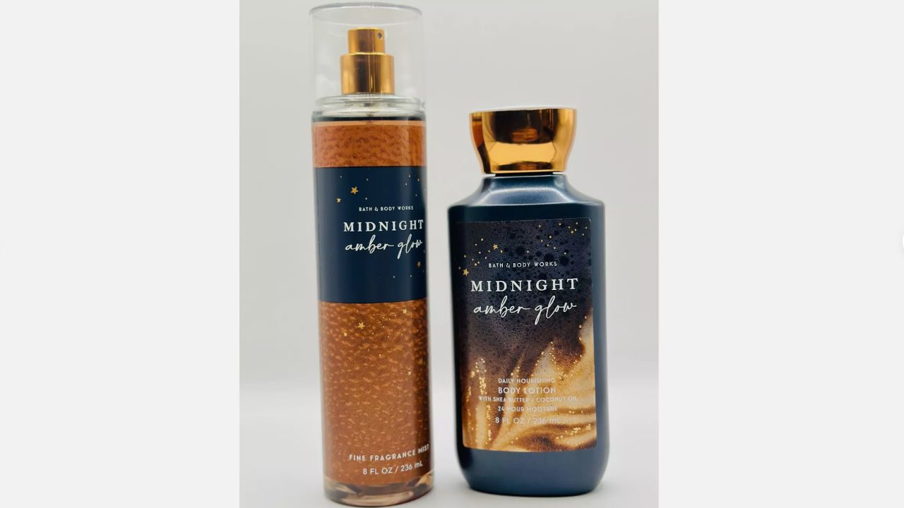 Bath & Body Works Midnight Amber Glow fragrance mist and body lotion with navy and gold star-themed packaging