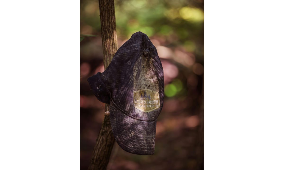 Outdoor hiking trail marker, forgotten gear from a nature trek, symbol of rustic adventure, wilderness storytelling prop, nature photography detail