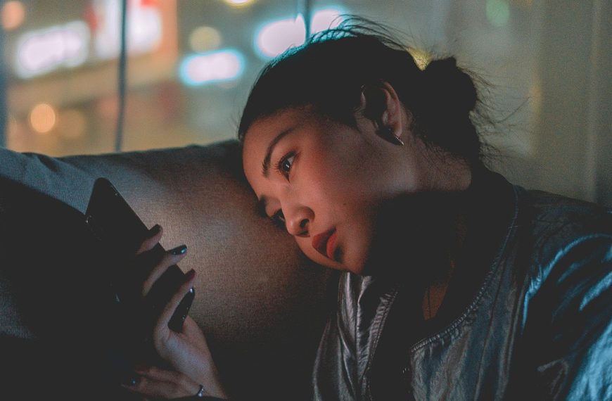 Sad woman cell phone