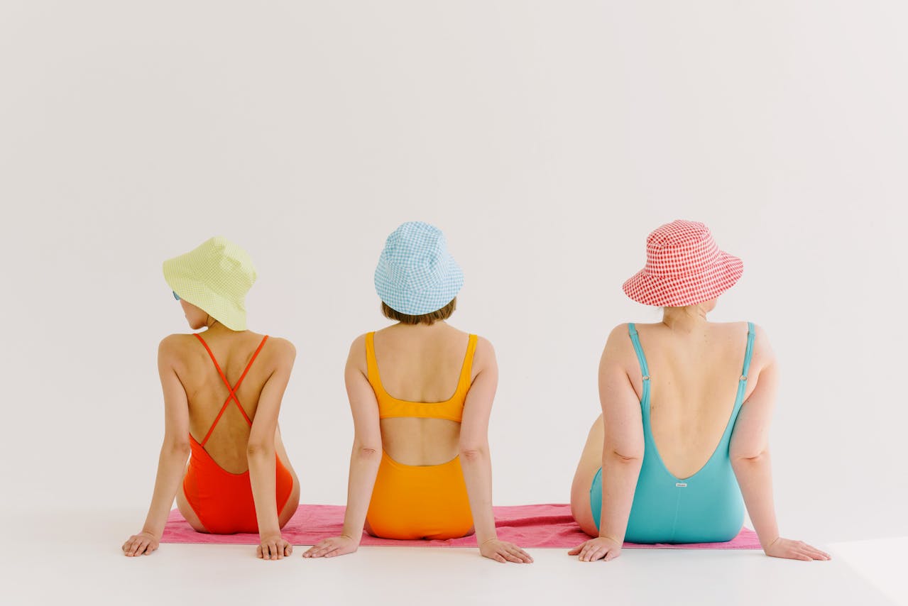 Beach vacation photoshoot, summer swimwear collection, poolside fashion inspiration, vibrant resort wear styling, sun-soaked holiday preparation