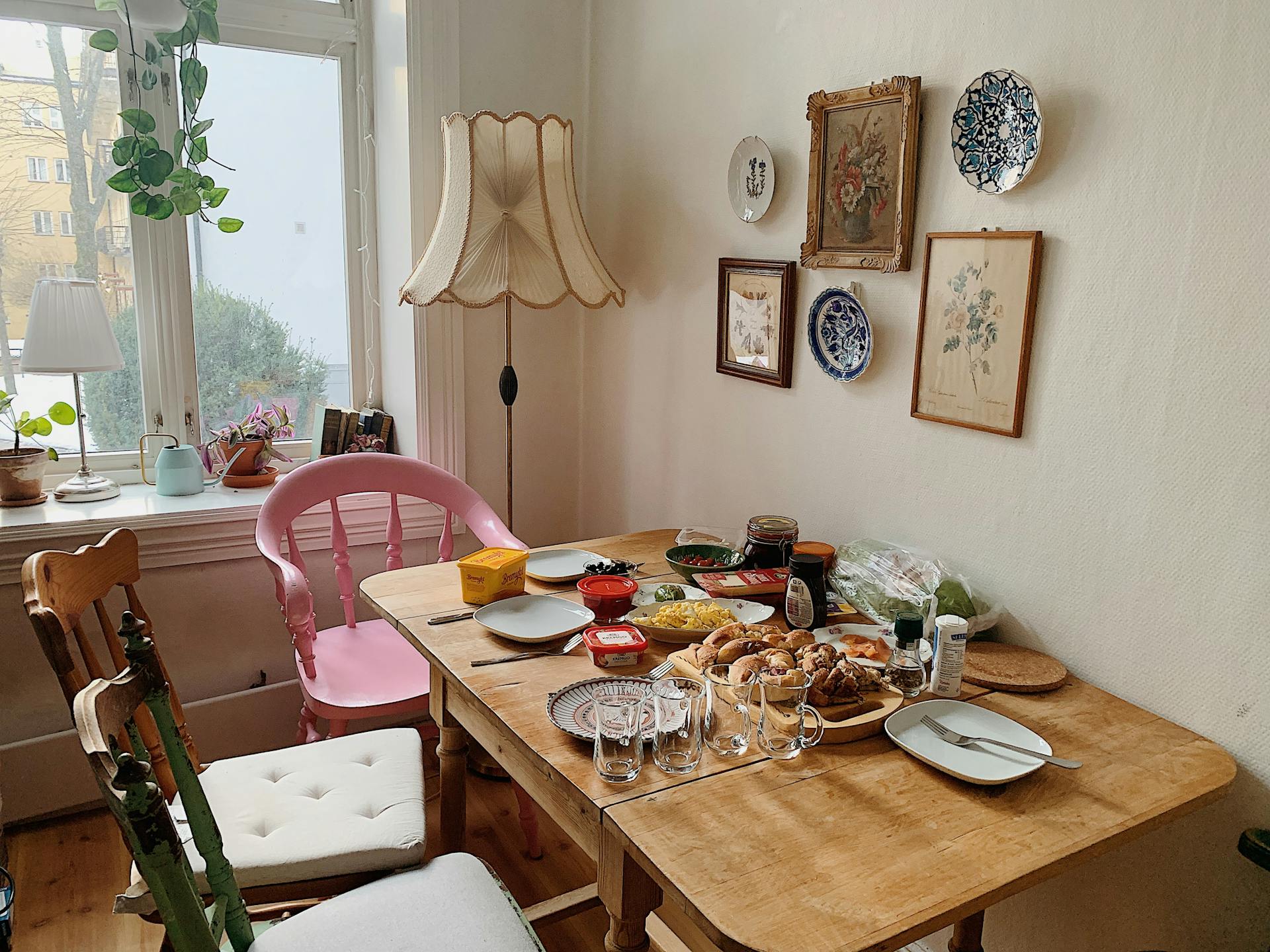 a room with wooden mounted plates hanger with wall frame