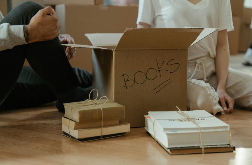 Brown Cardboard Box on Brown Wooden Table