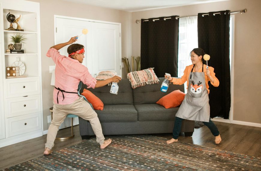 Smiling Couple Fighting with Detergents