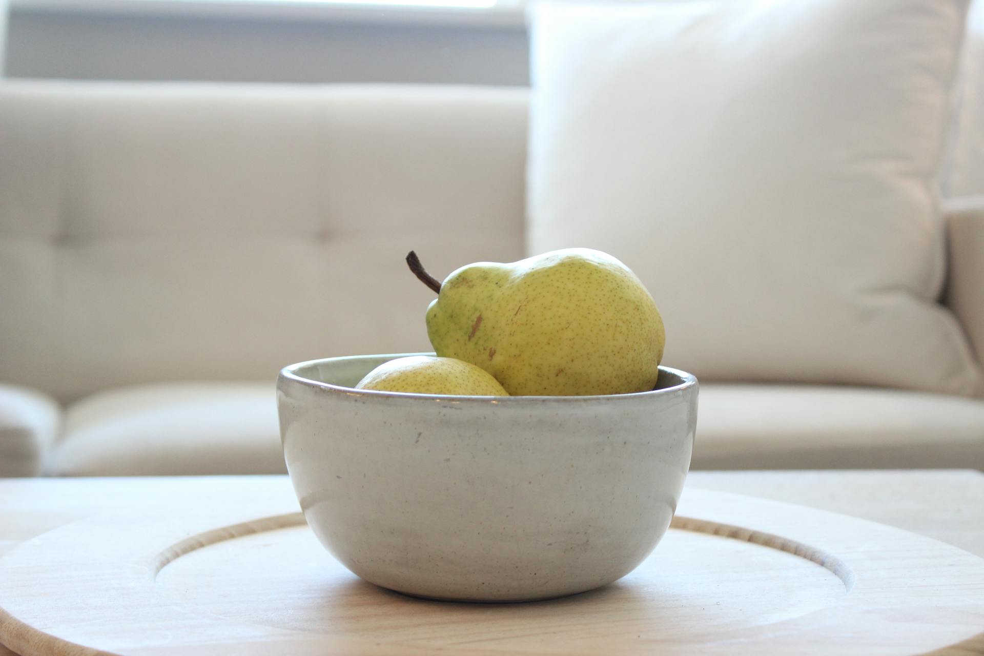 Bowl of Pears on a Table in a Cozy Room
