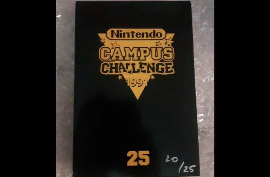 1990 Nintendo Campus Challenge NES cartridge, gray NES game with white label, official Nintendo branding, retro competition game, placed on flat surface