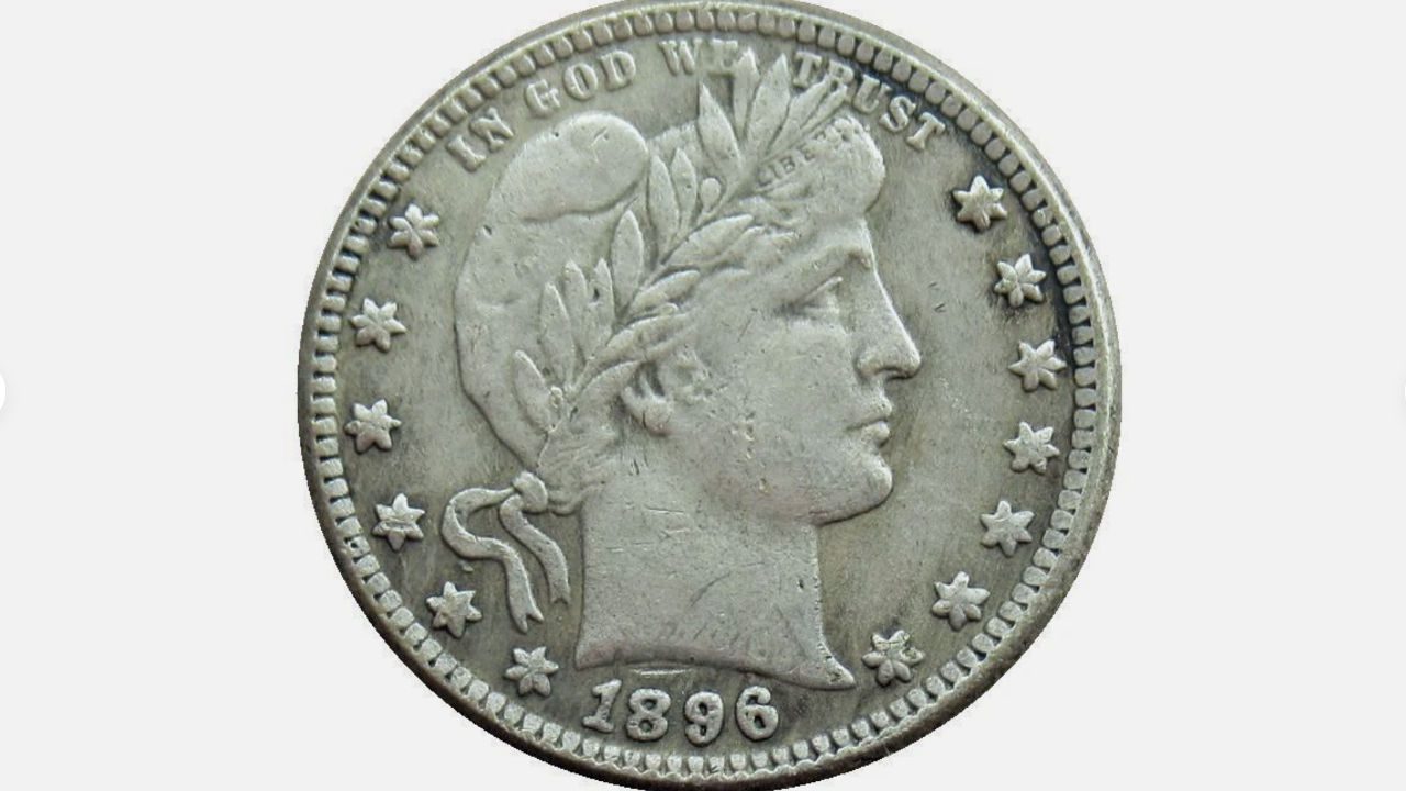 1896-S Barber quarter showing Liberty head with laurel wreath and 13 stars around edge