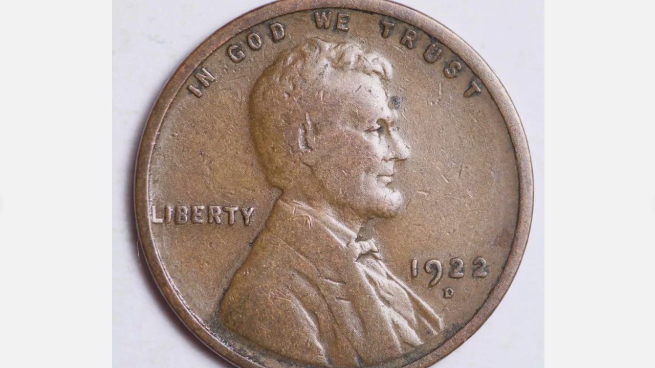1922 Lincoln penny showing Abraham Lincoln’s profile with “IN GOD WE TRUST,” “LIBERTY,” and “1922 D''