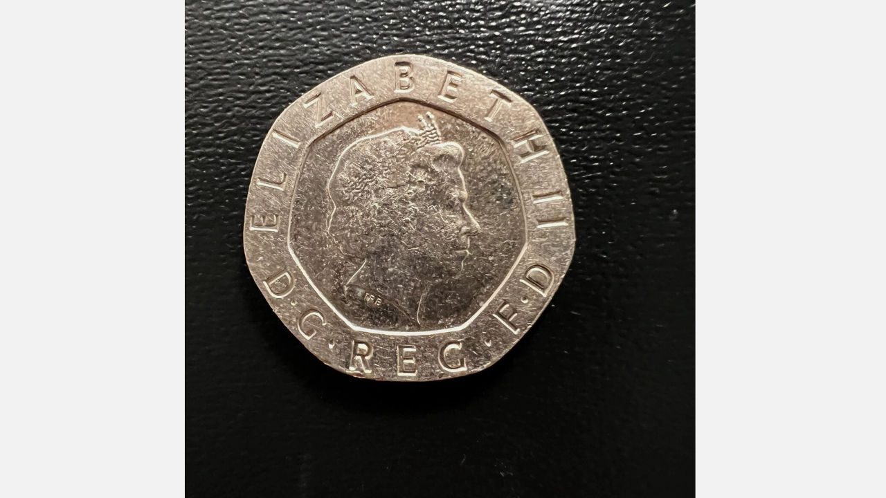 British 20p coin with Queen Elizabeth II portrait, missing the date