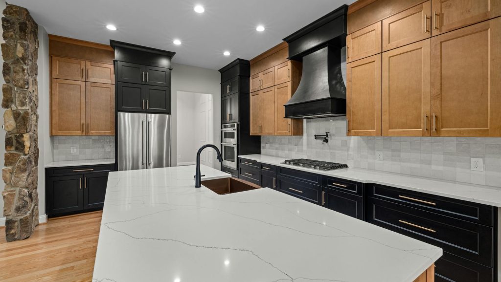 Black cabinets with gold hardware