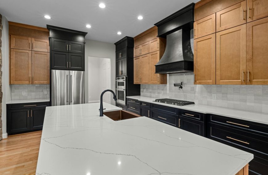 Black cabinets with gold hardware