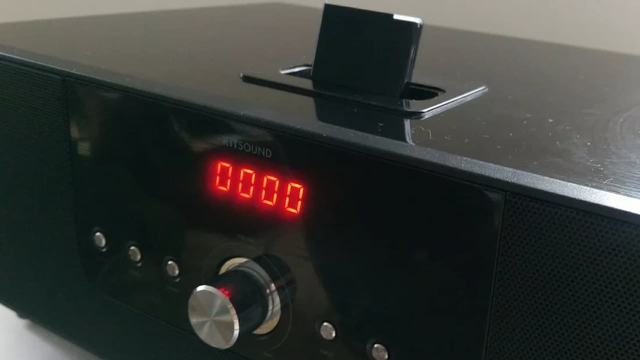 Bluetooth speaker, compact design, mesh front grille, control buttons on top, portable size, matte finish, wireless audio device