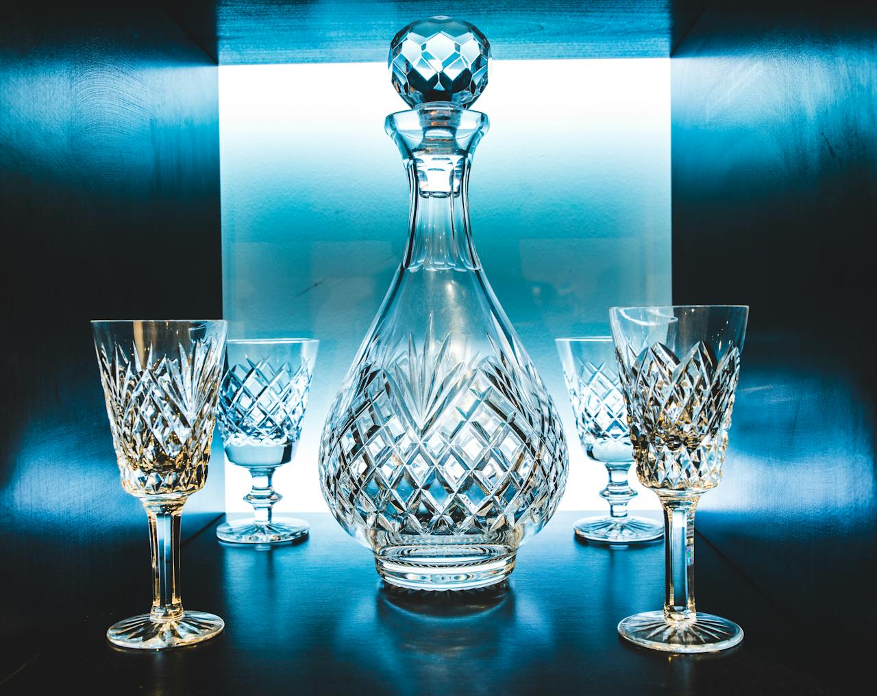 Crystal Carafe and Wineglasses in Blue Lighting