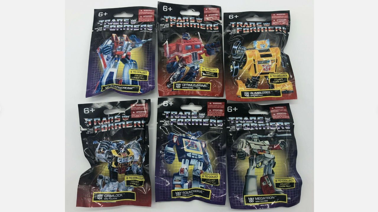 Set of six Hasbro limited edition Transformers mini figurines in sealed packaging featuring characters like Optimus Prime