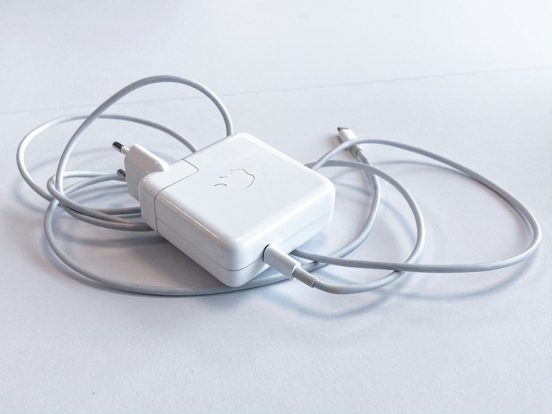 Apple Macbook Charger. All white.