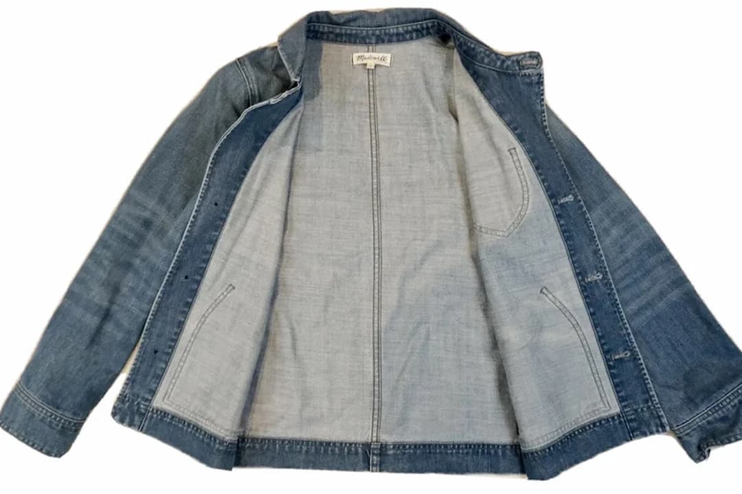 Madewell denim jacket, light blue denim, open front, long sleeves, visible inner stitching, interior pockets, casual outerwear