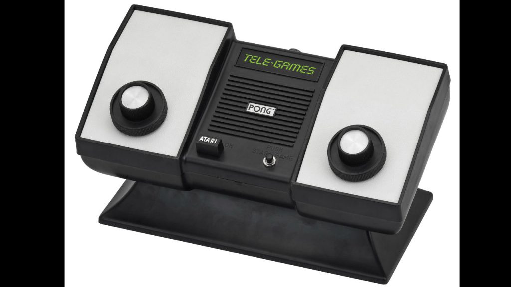 Vintage Atari Pong console with two built-in dial controllers and "TELE-GAMES" label above the speaker