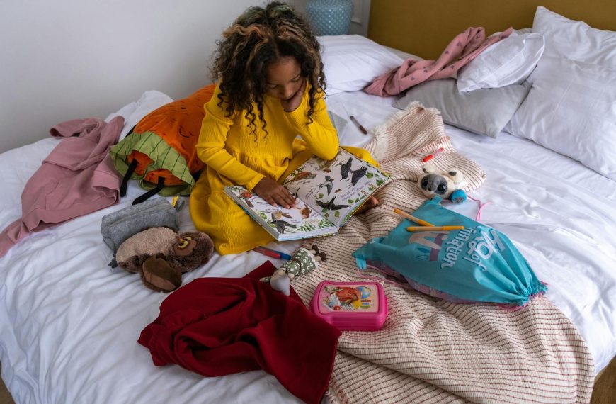 Piles of clothes on the bed
