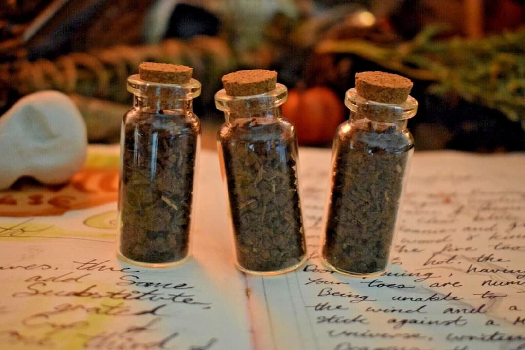 soil glass vials, clear containers, various soil colors and textures, labeled samples, sealed caps, neatly arranged in a row