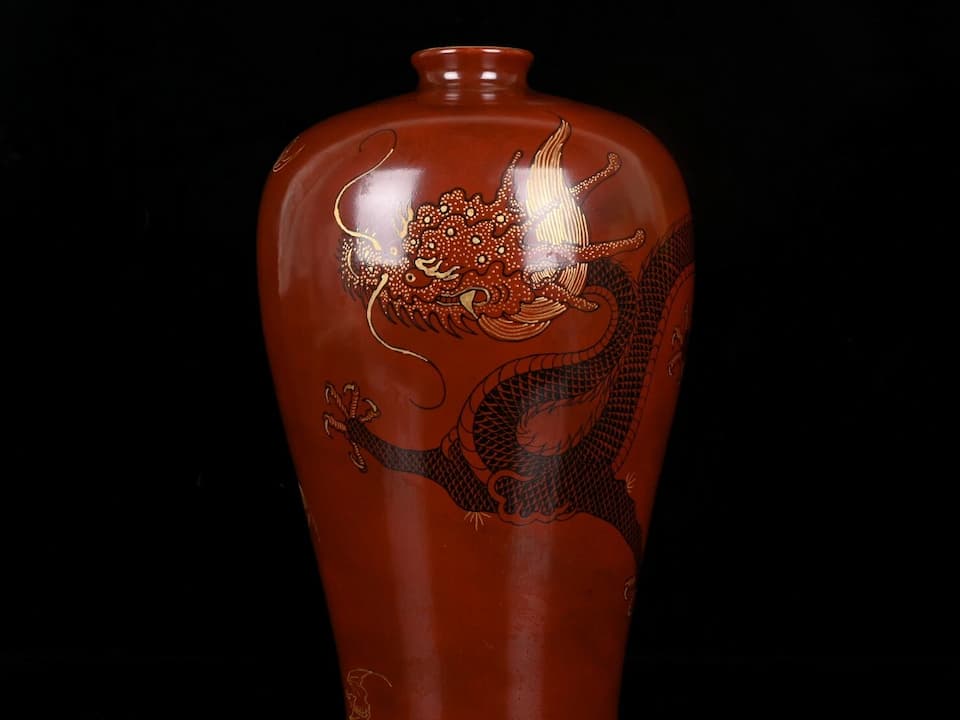 The Qianlong Vase, Qing Dynasty porcelain, intricate floral patterns, blue and white enamel, tall narrow neck, bulbous base, Chinese imperial seal mark, 18th-century craftsmanship