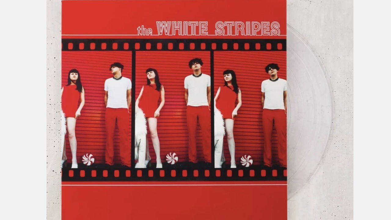 the white strips record, wearing whit shirt and red pants, lady with cute red dress, a classic vinyl record