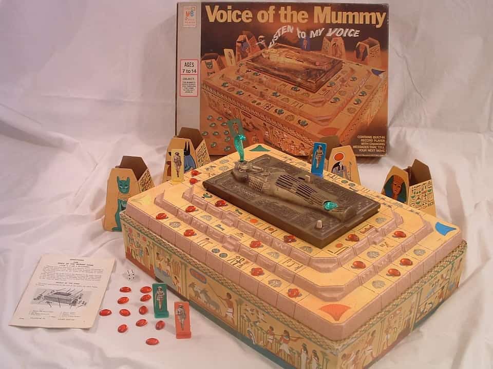 Voice of the Mummy board game, vintage 3D game board, raised tomb layout, sarcophagus centerpiece with built-in record player, colorful pathway tiles, jewel tokens, 1970s design