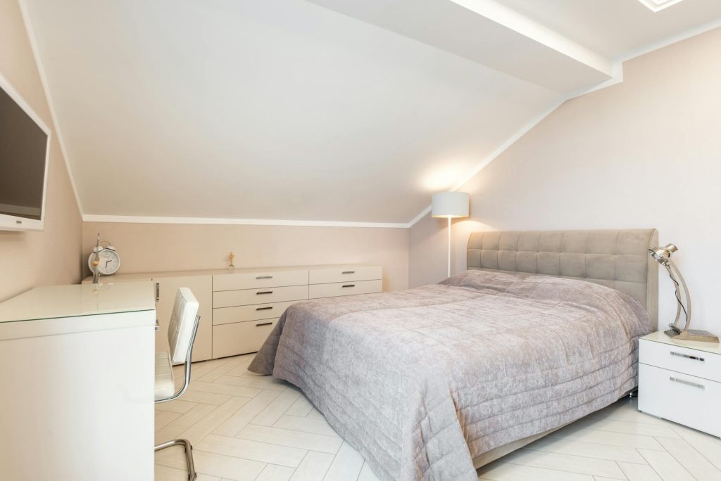 White bedroom with modern furniture