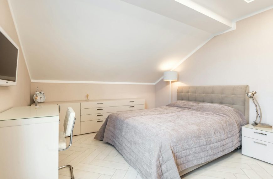 White bedroom with modern furniture