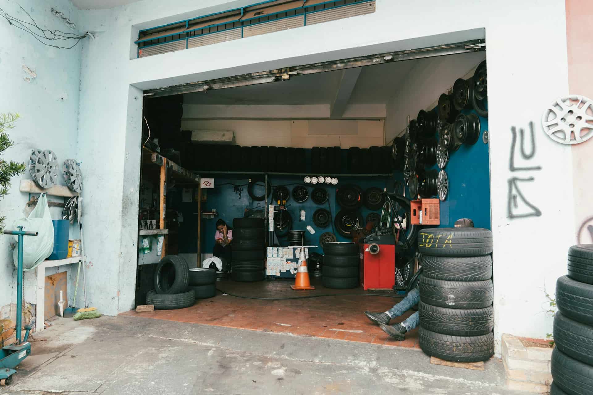 garage-filled-with-lots-of-tires-and-tires