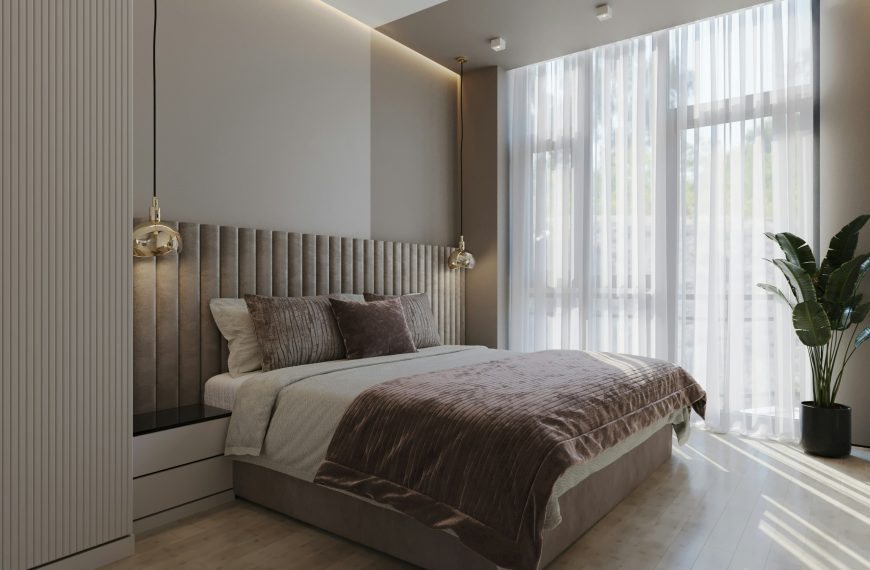 a bedroom with a bed and a large window