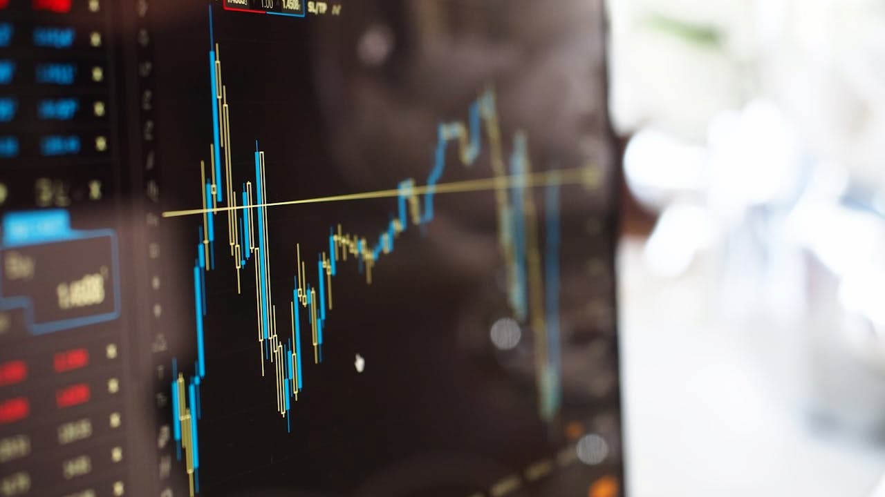 Financial chart with candlestick graph, person’s silhouette in background, upward and downward price trends, data points and lines, representation of financial risks and profits, close-up view, business decision concept