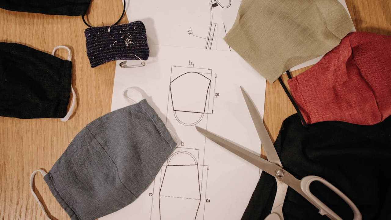 reusable cloth masks, fabric material, ear loops, various colors and patterns, washable design, pleated or fitted shape, eco-friendly option