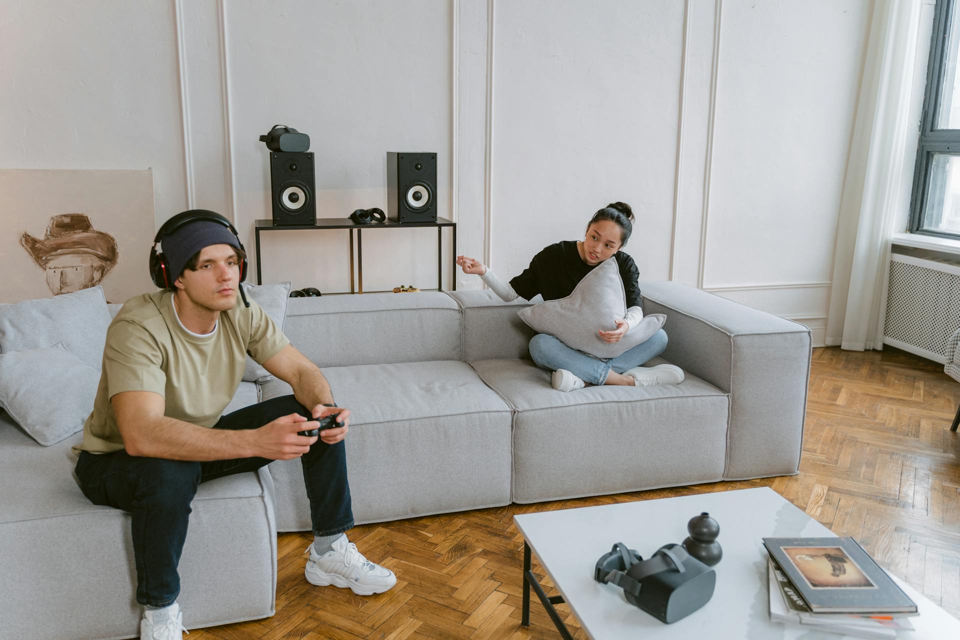 Man Playing Video Game While Playing Sofa